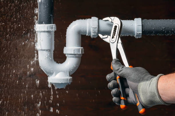 Professional Emergency Plumber technician working in Elkader, IA